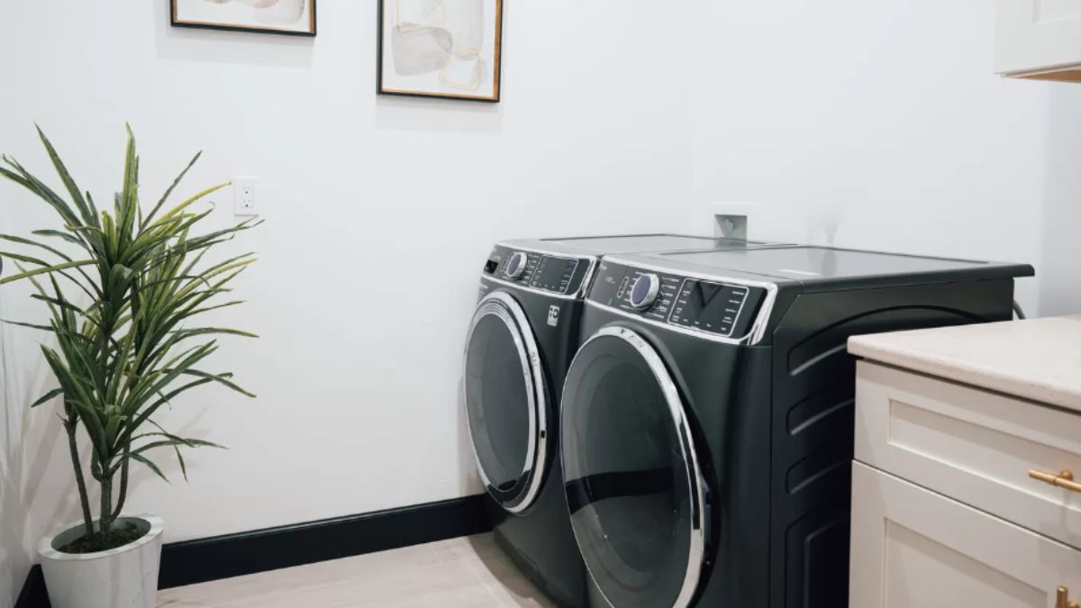 A laundry room with washing machines.