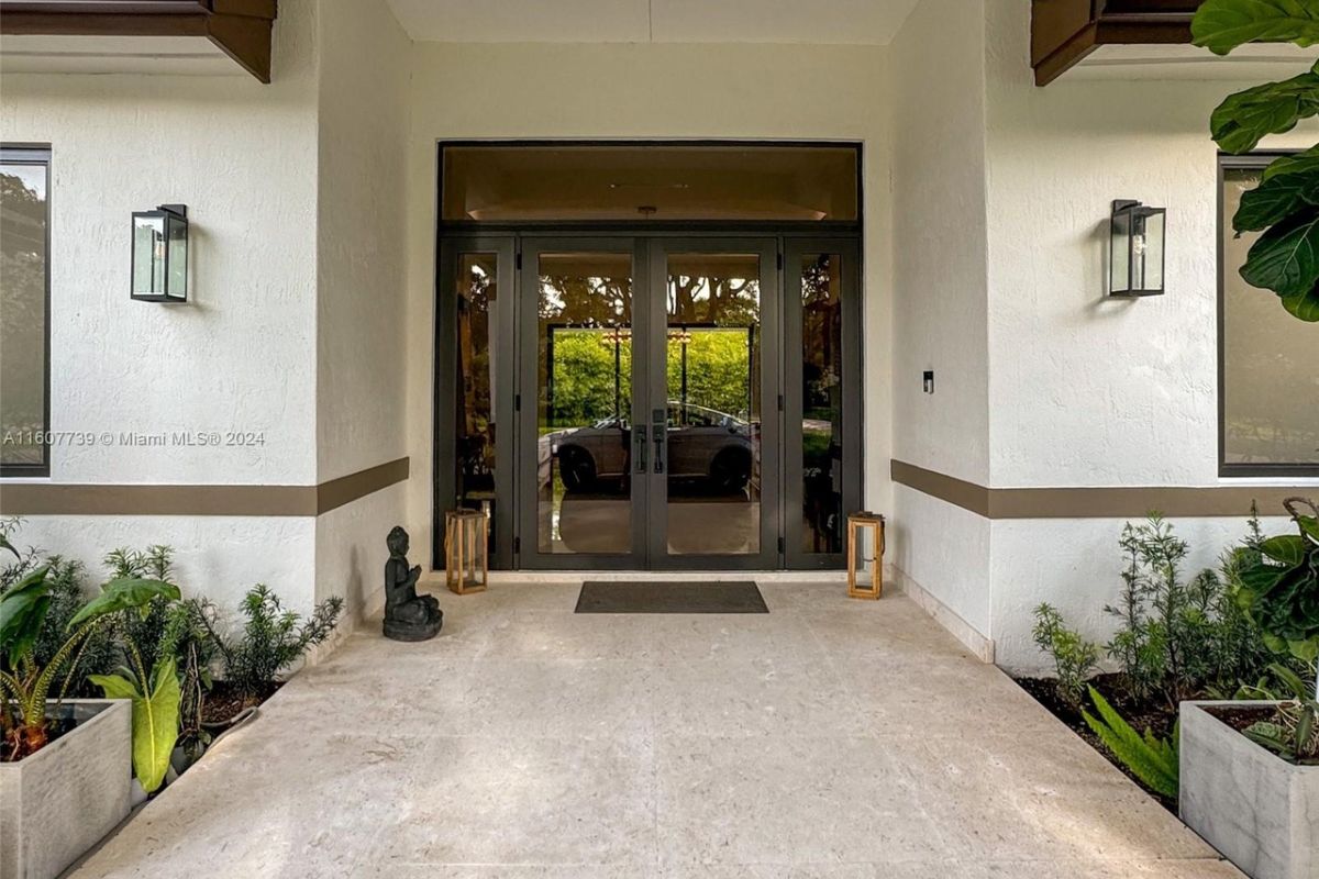 A front entry with a glass door.