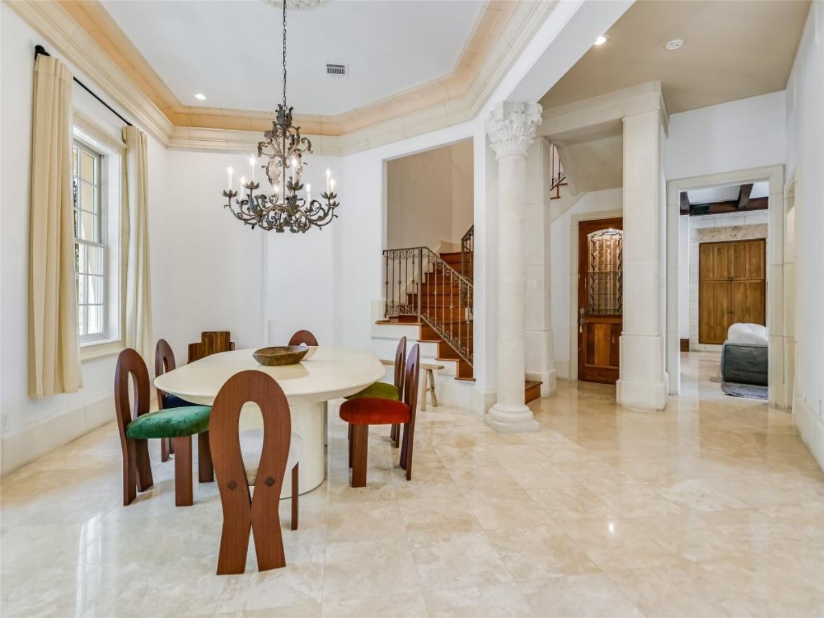 Dining room with a chandelier.