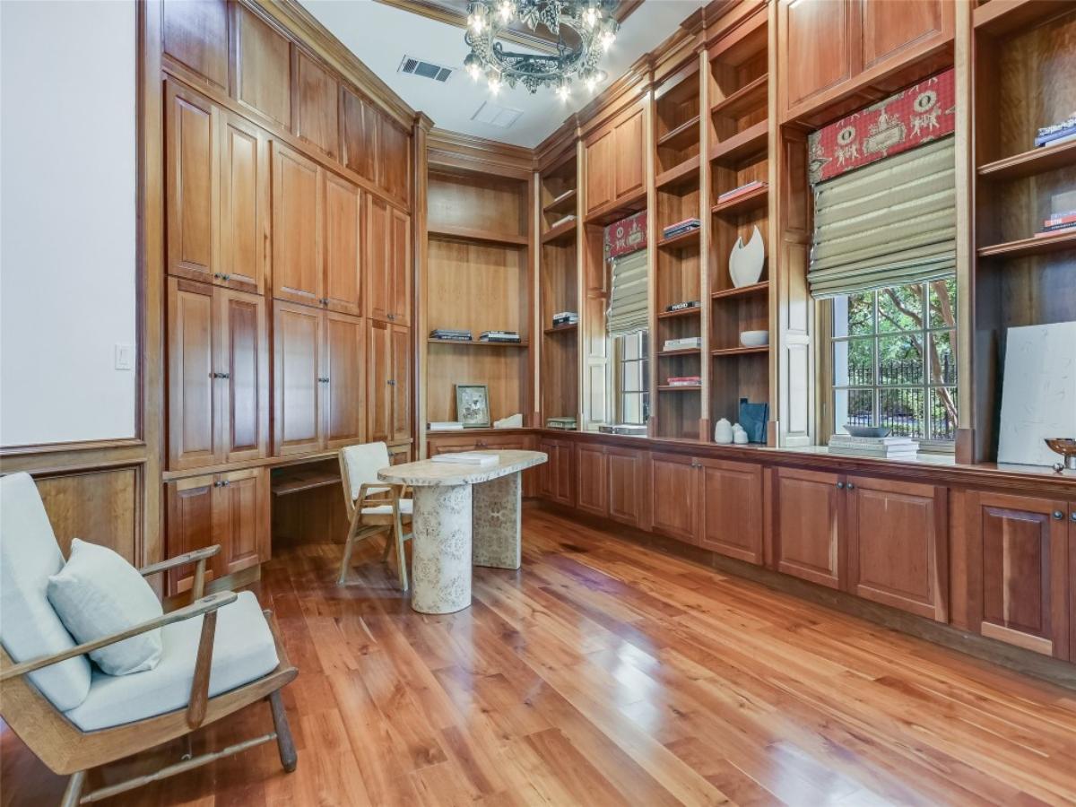 Home office with custom-made cabinetry.