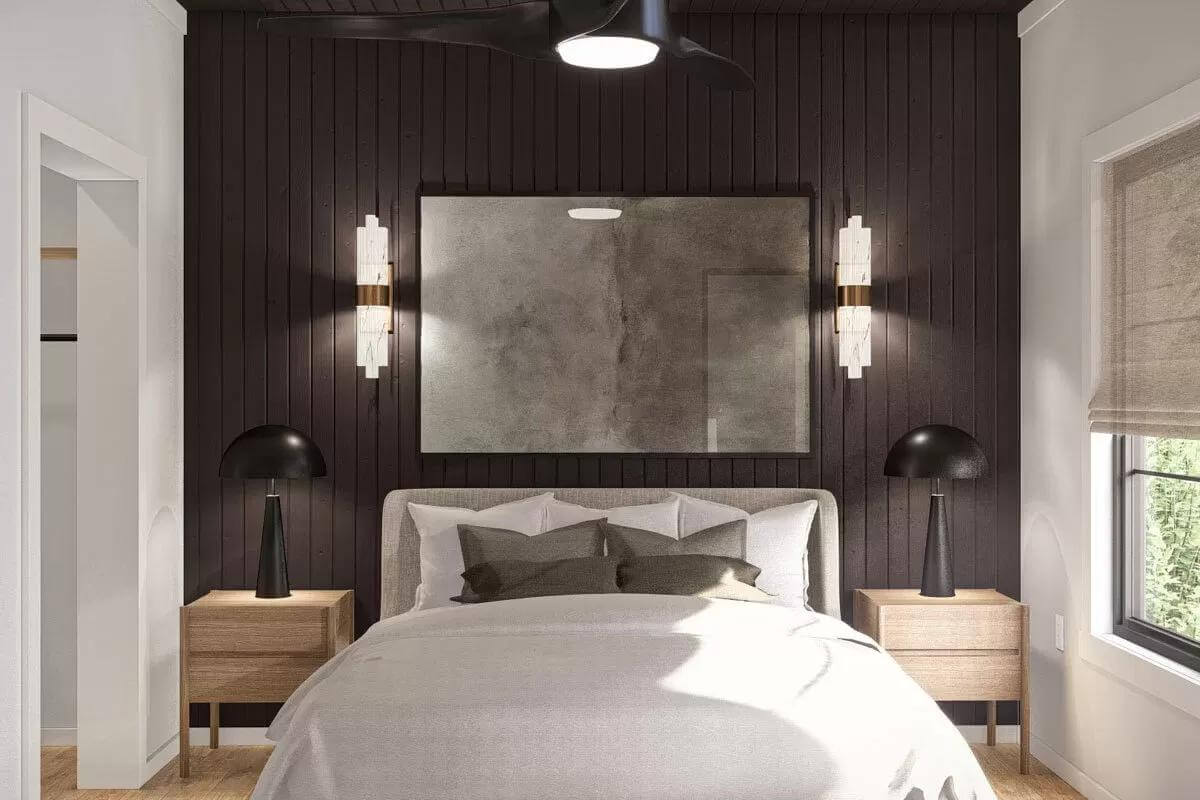 The bedroom includes an upholstered bed and wooden nightstands against the paneled accent wall.