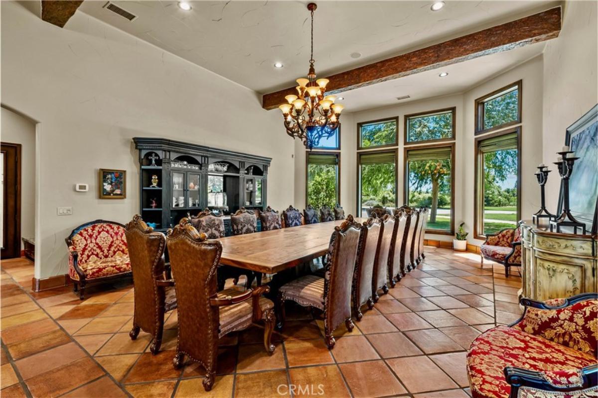 Dining room with a chandelier.