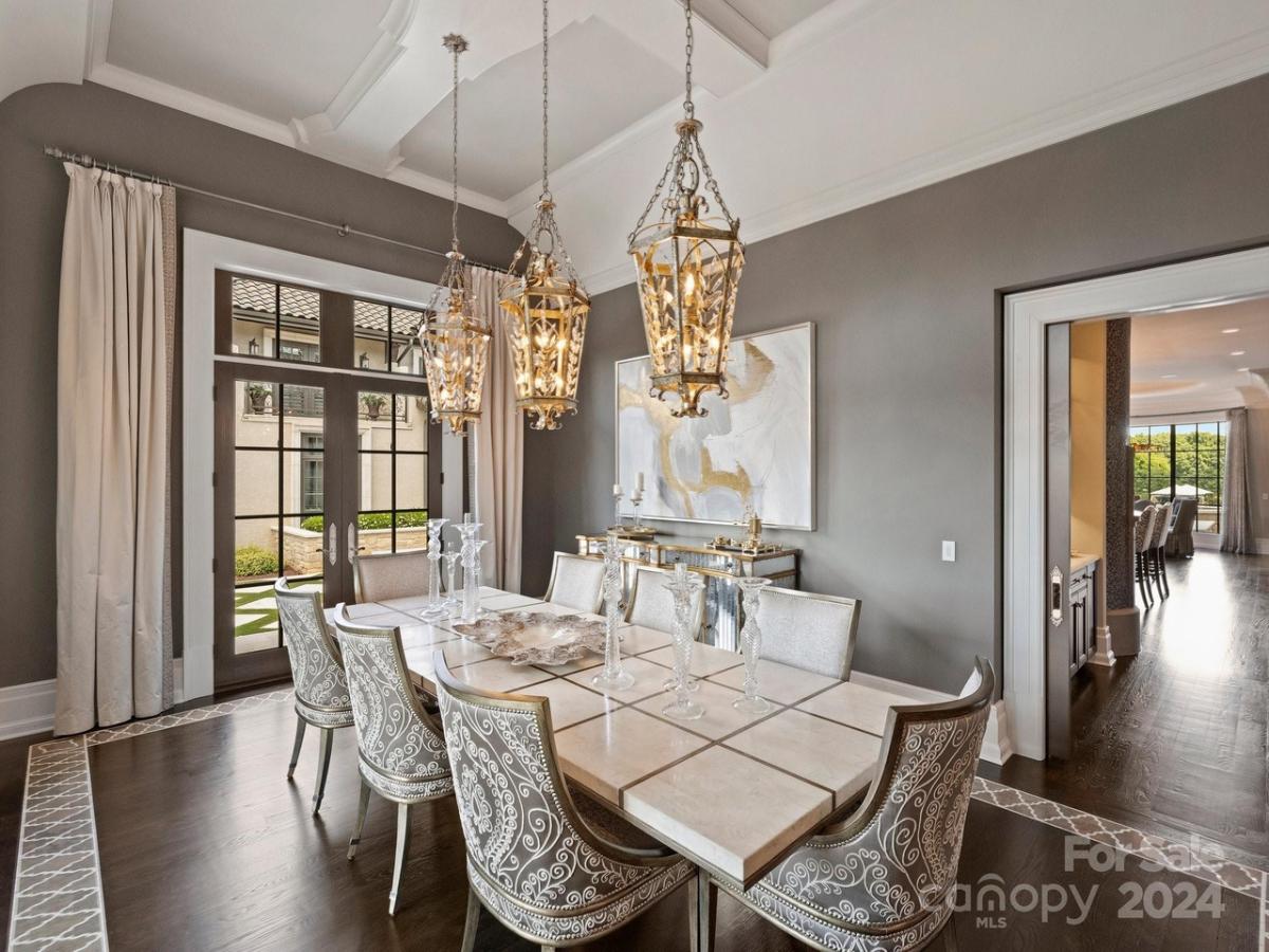 Dining room with a large table and chairs.