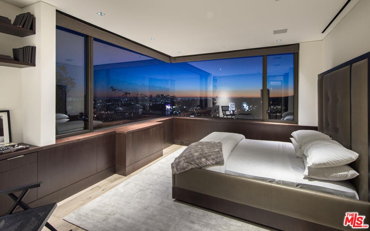 Bedroom with glass windows.