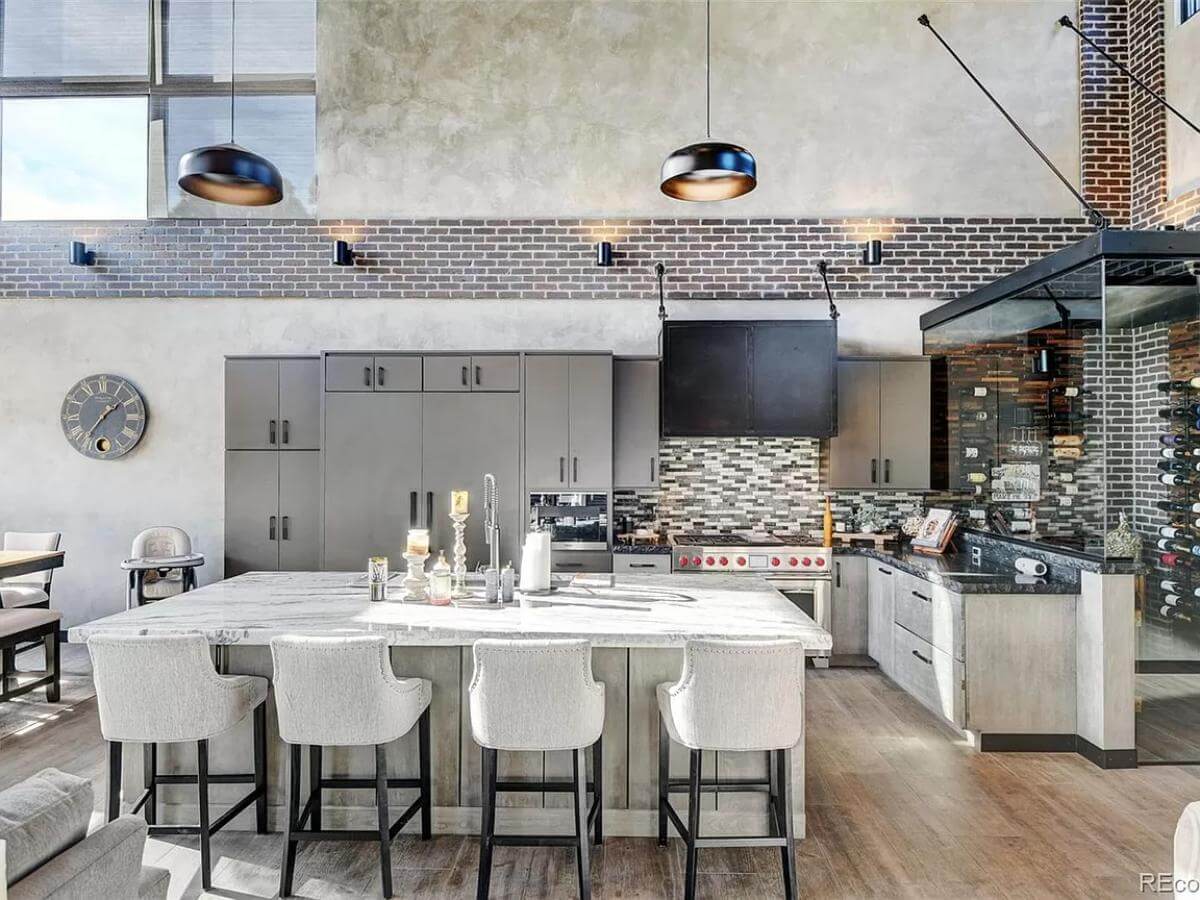 Kitchen with custom cabinetry and a large island.