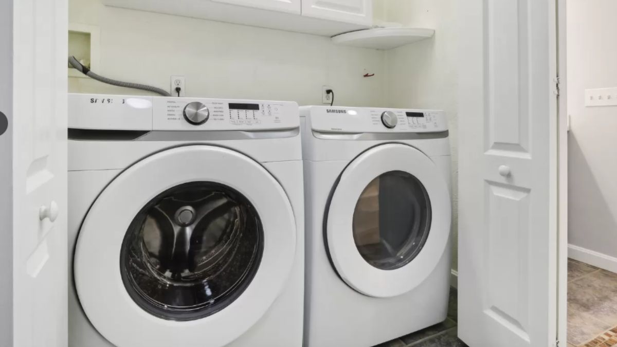 A laundry room with washing machines.