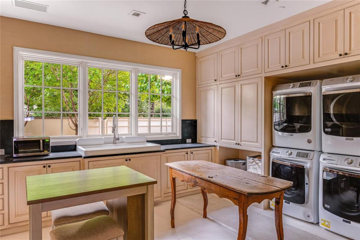 Laundry room with custom cabinetry.