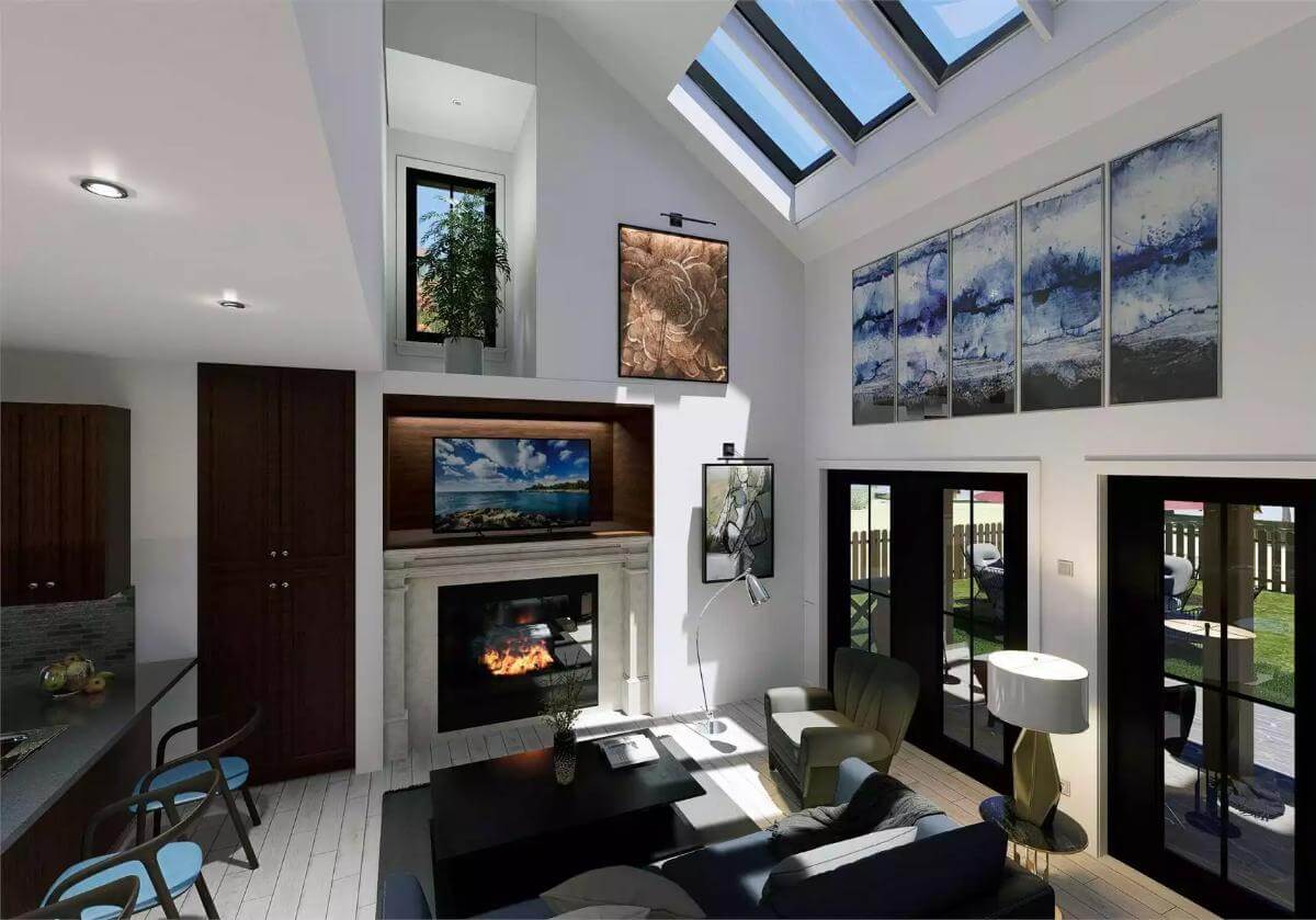 Great room with a fireplace and a vaulted ceiling fitted with skylights.