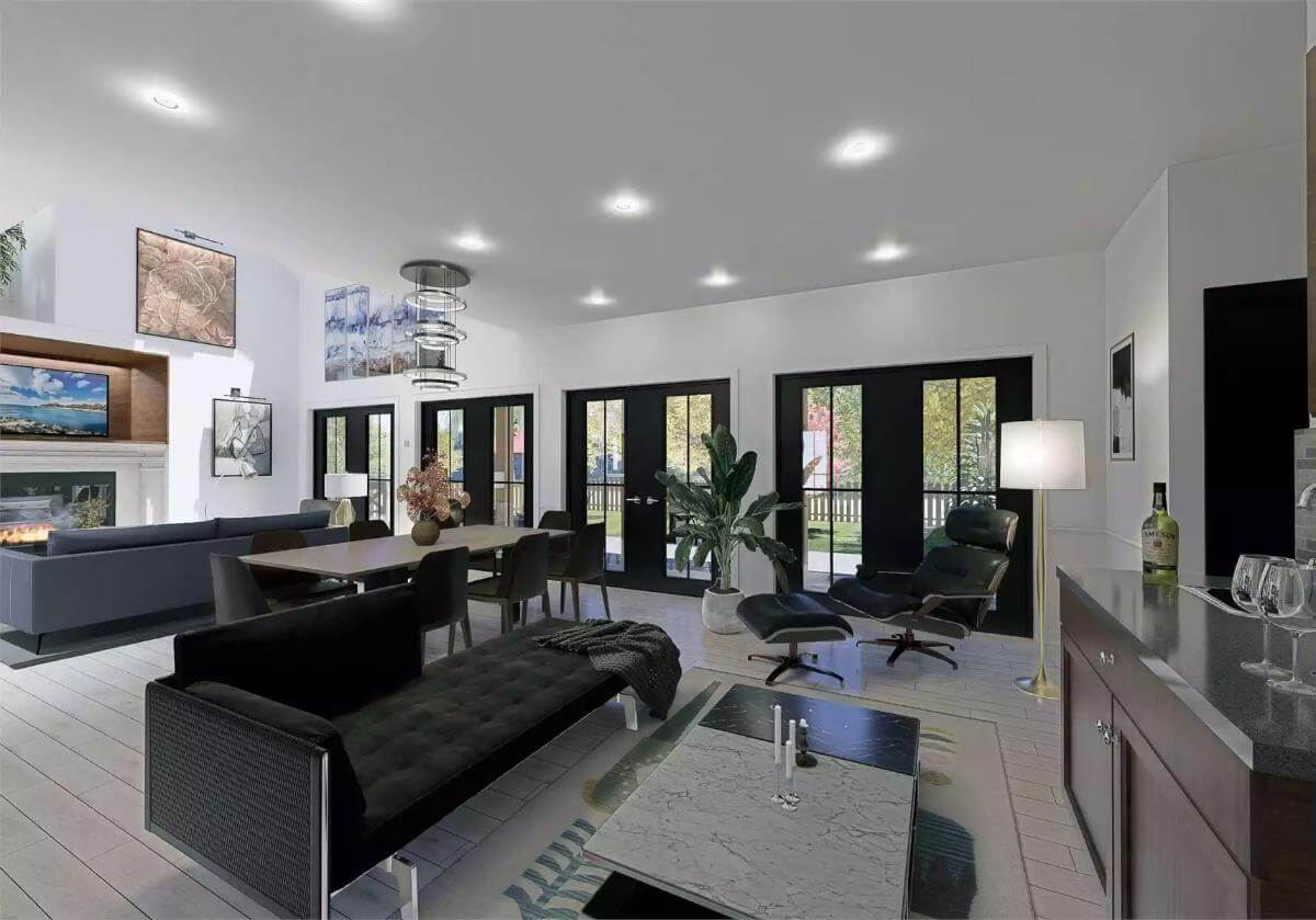 Family room and dining area with French doors that open to a covered patio.