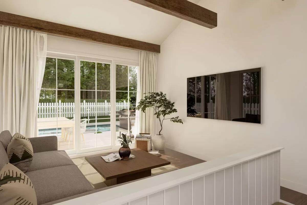 Living room with a sectional sofa, a wooden coffee table, and a wall-mounted TV.