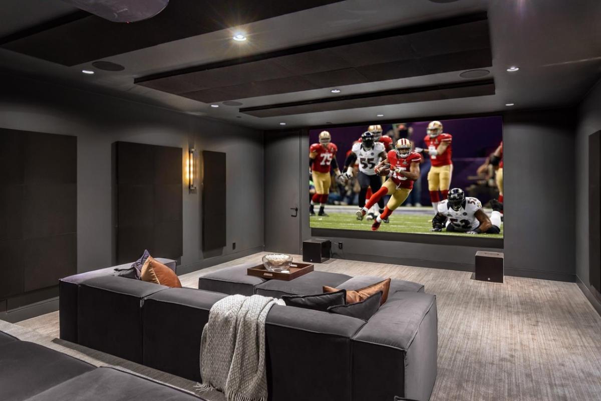 Home theater with custom lighting.