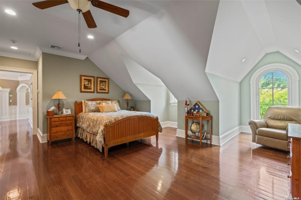 Bedroom with a living space.