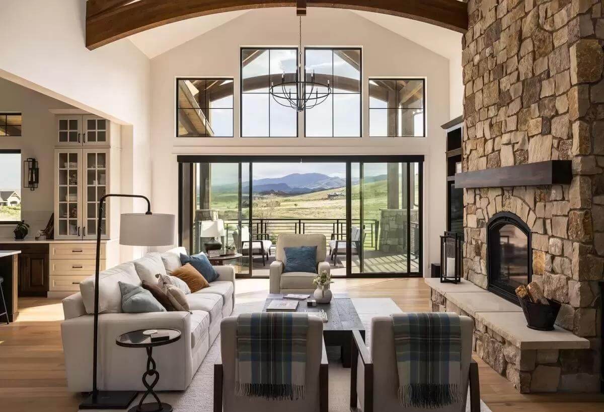 A wall of windows bathes the great room with natural light.