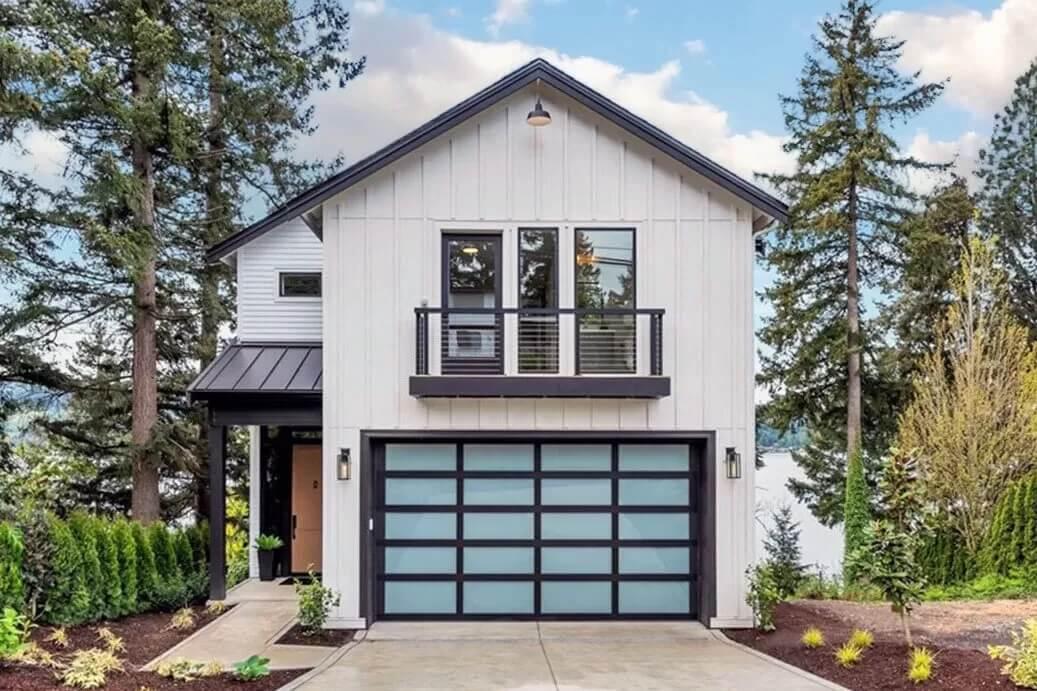 Modern Farmhouse with Sleek Garage Door Design