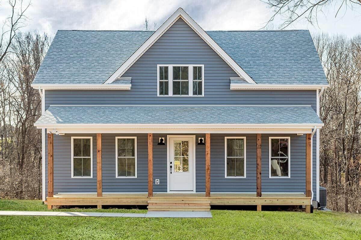 Classic Blue Farmhouse with Inviting Porch