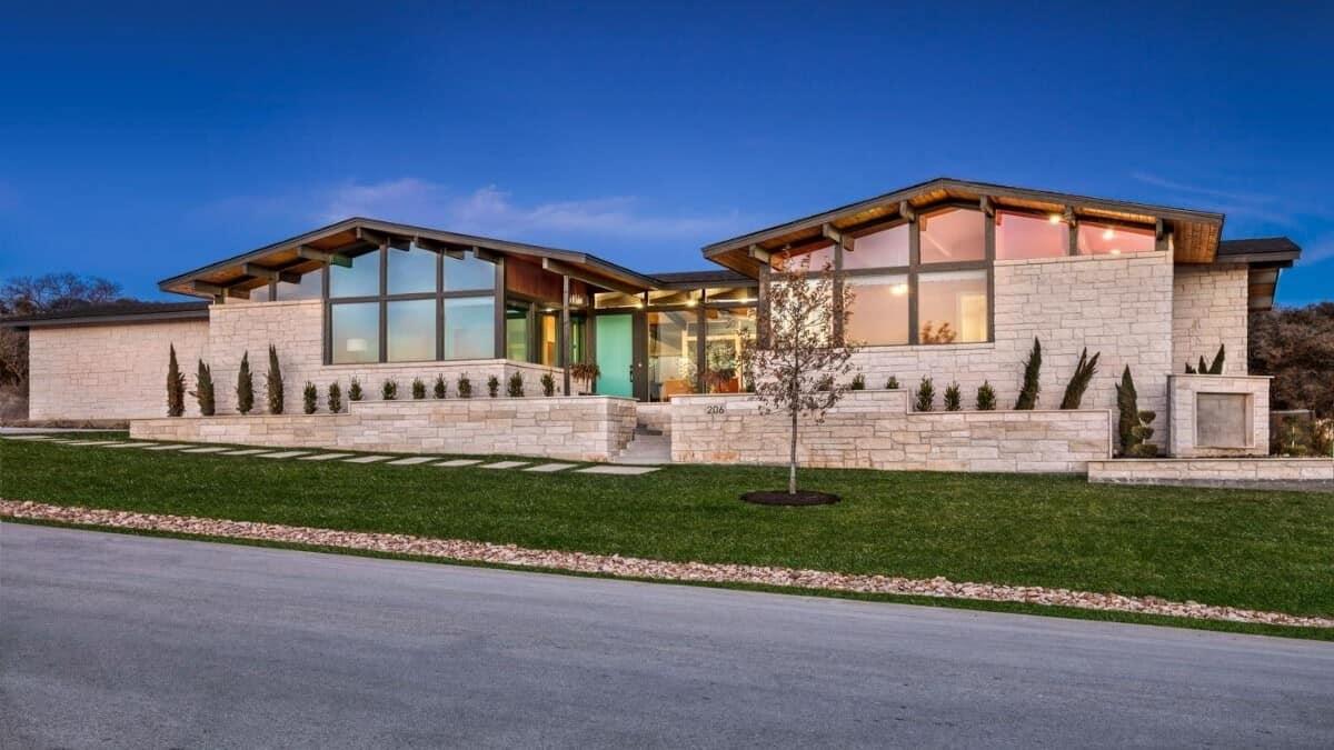 Striking Stone Facade with Expansive Windows