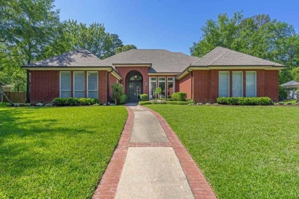 Classic Red Brick Ranch with Symmetrical Appeal