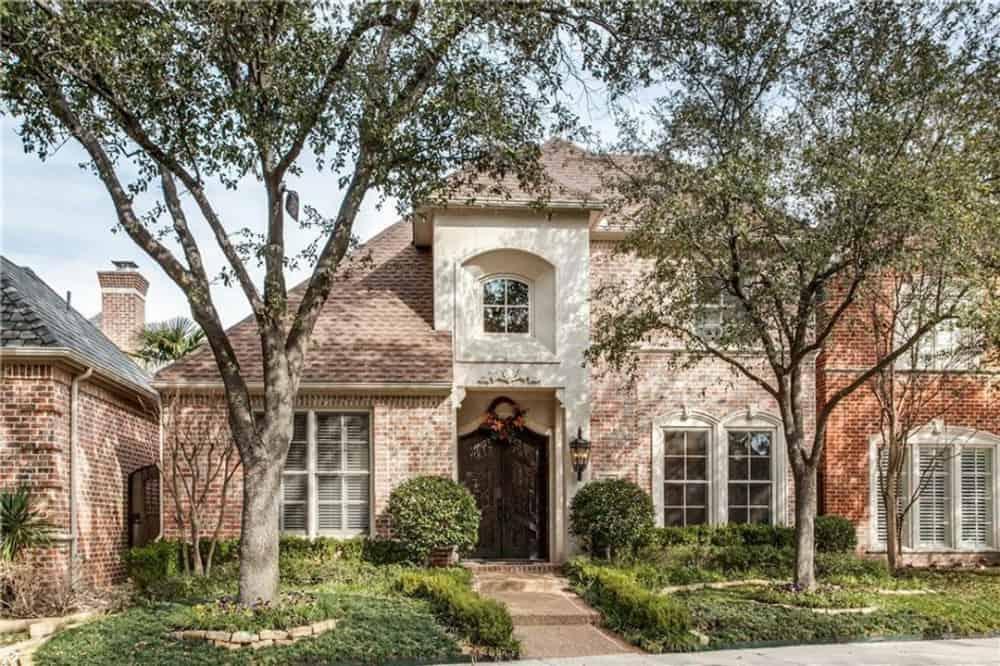 Classic Brick Facade with Elegant Arched Entryway