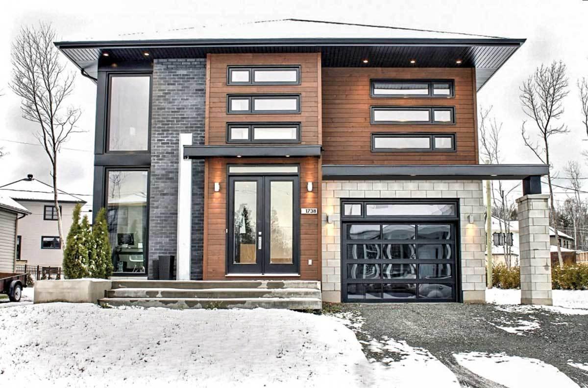 Check Out the Sleek Contrast of Wood and Brick on This Facade