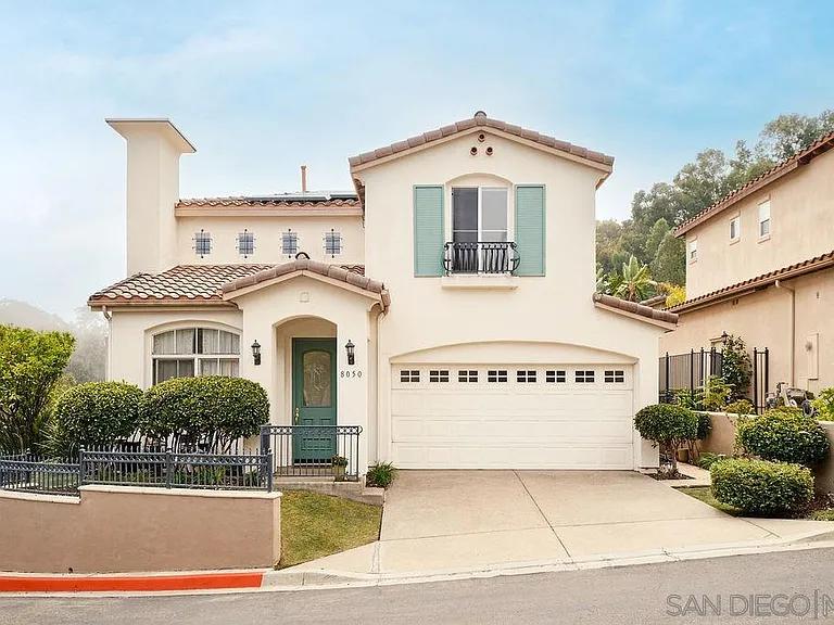 Mediterranean Style Home with Cheerful Shutters