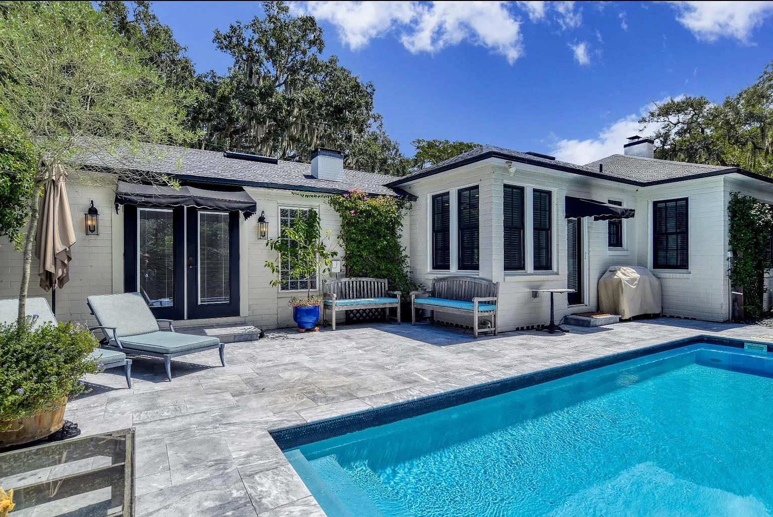 Check Out This Stylish Poolside Patio with Modern Pavers