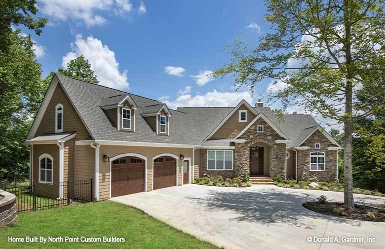 Charming Craftsman with Stone Accents and Dormer Windows