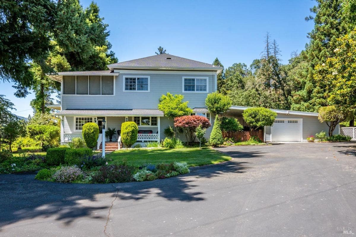 Front view of a two-story house with a driveway.