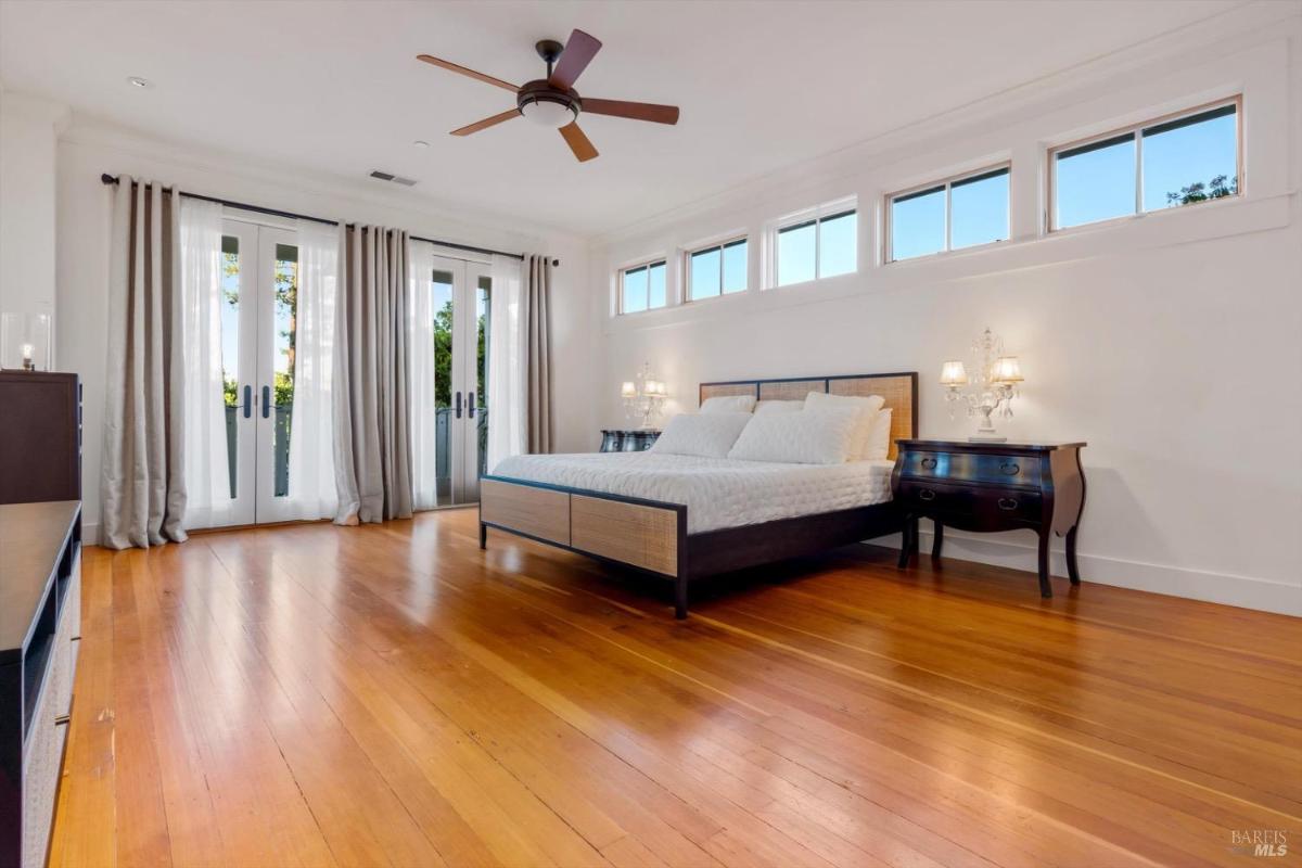 A bedroom leading to an en-suite bathroom and a walk-in closet.