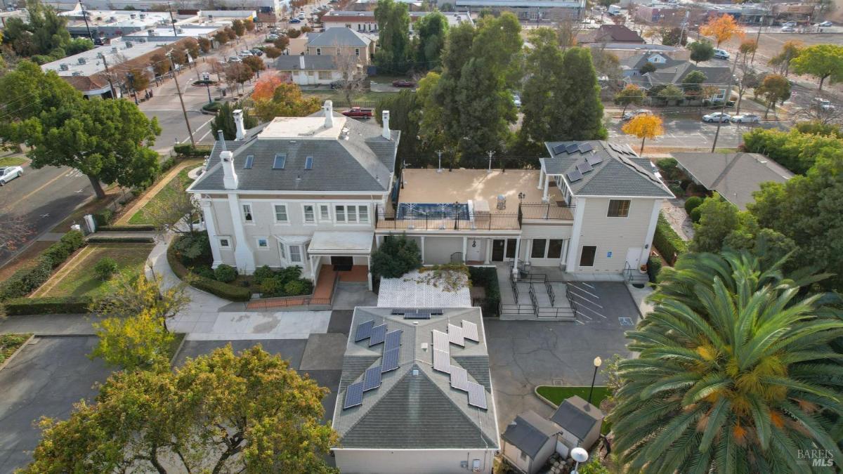 Top-down view showing the roof and surrounding area of the property.