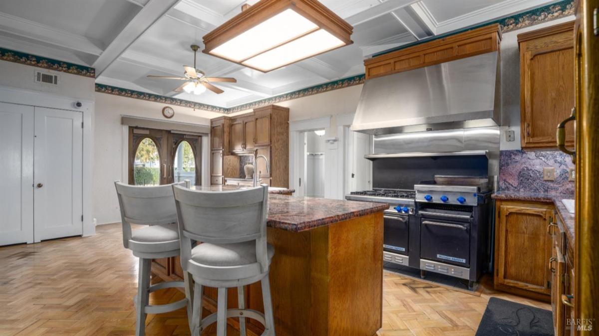 Kitchen with stainless steel appliances and a center island.