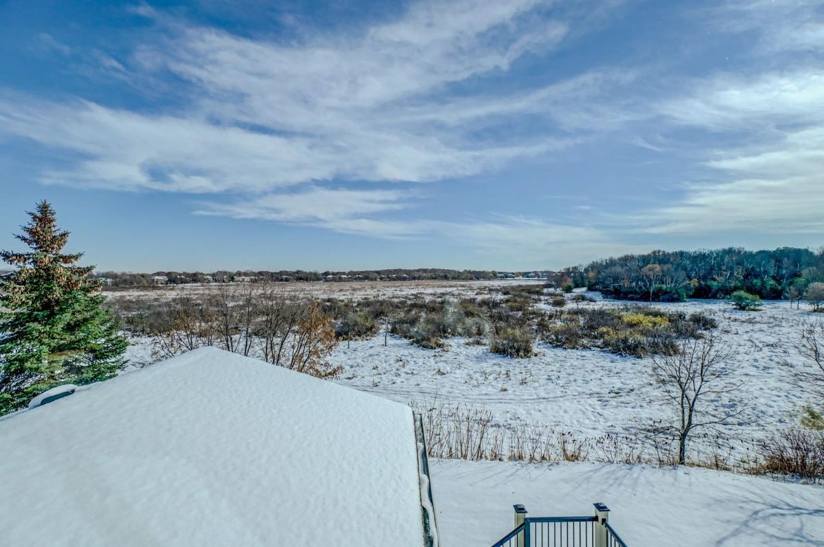 A peaceful, snow-covered landscape stretching into the horizon.