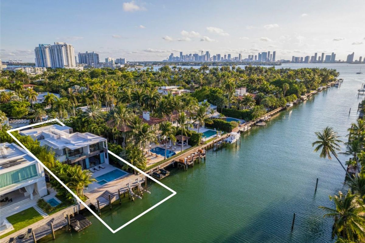 Exclusive waterfront estate with private dock and panoramic canal views.