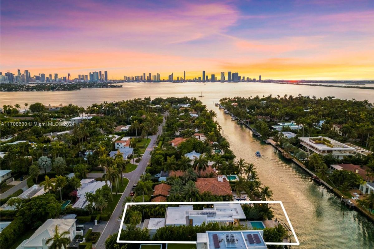 Luxurious canal-front property with breathtaking sunset views over the Miami skyline.