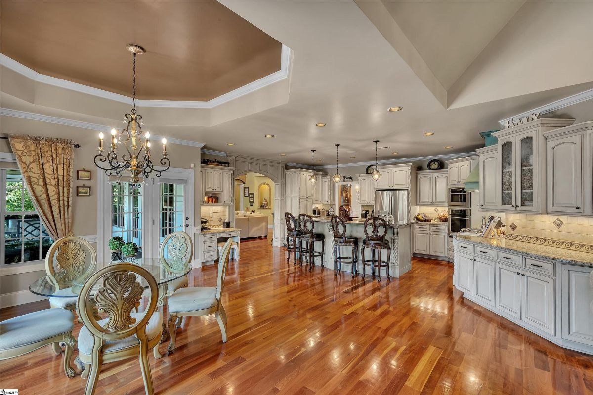 Kitchen and dining area blends modern elegance with classic charm.