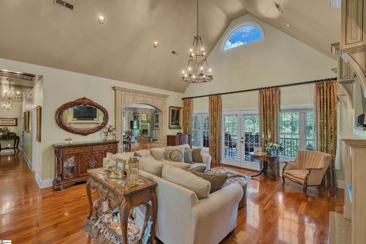 Living room features a vaulted ceiling.