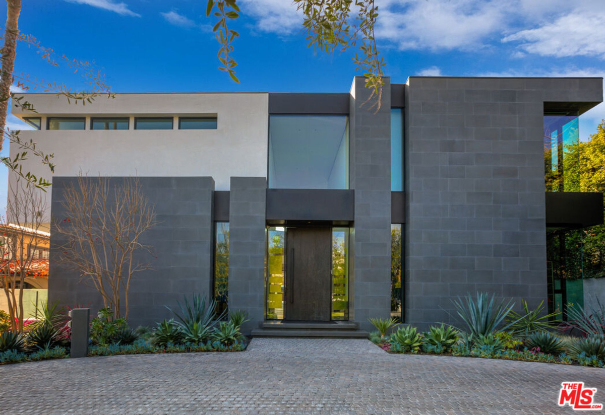 Stone and glass create a striking façade for this contemporary home.