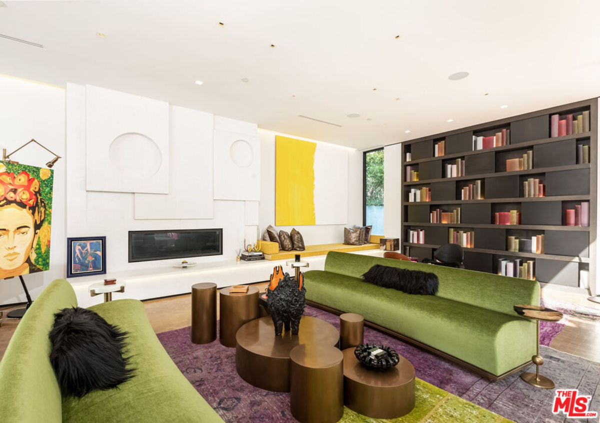 Bold colors and unique wall treatments define this modern living space.