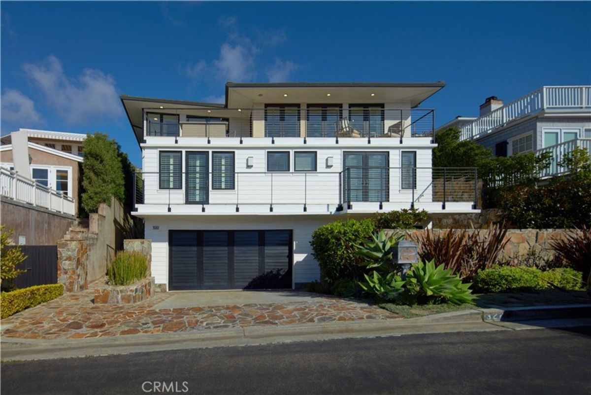 Sunlight highlights a coastal home's modern design