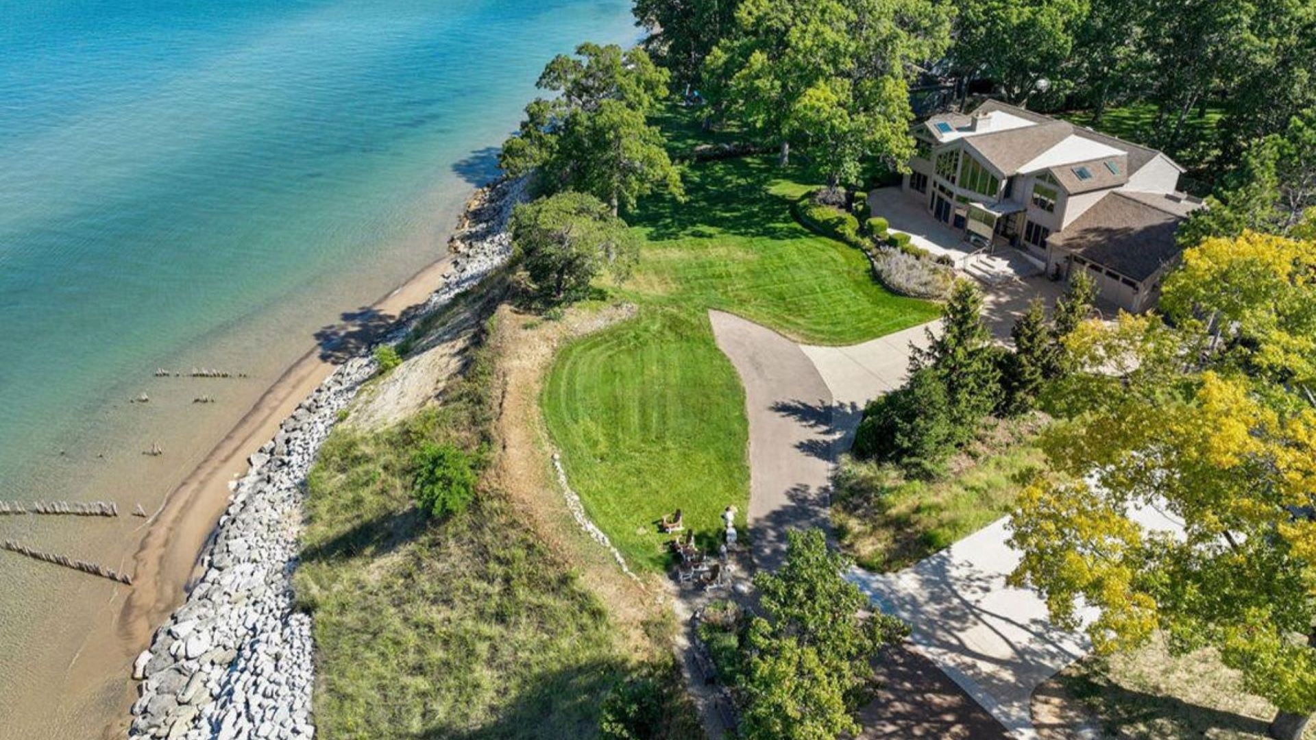 Explore this 5,572 Sq. Ft. Mansion in Stevensville, MI with Stunning Lake Setting