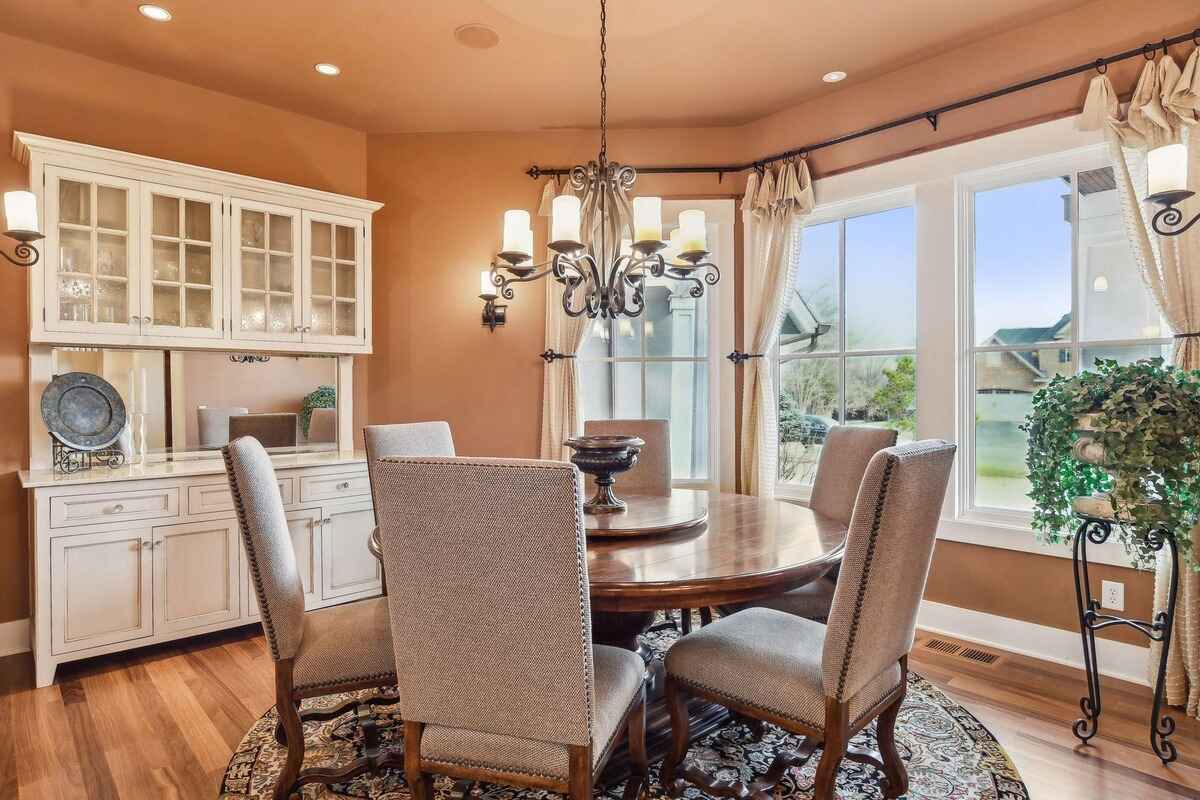 A wide-angle view shows the open-concept connection between the kitchen, dining, and living areas.