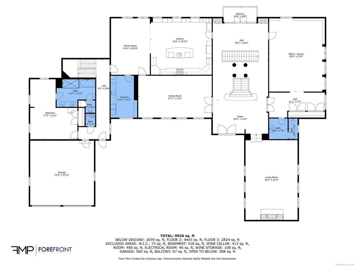 First-floor plan of a house showing a large open floor plan with kitchen, dining room, living room, and multiple bedrooms.