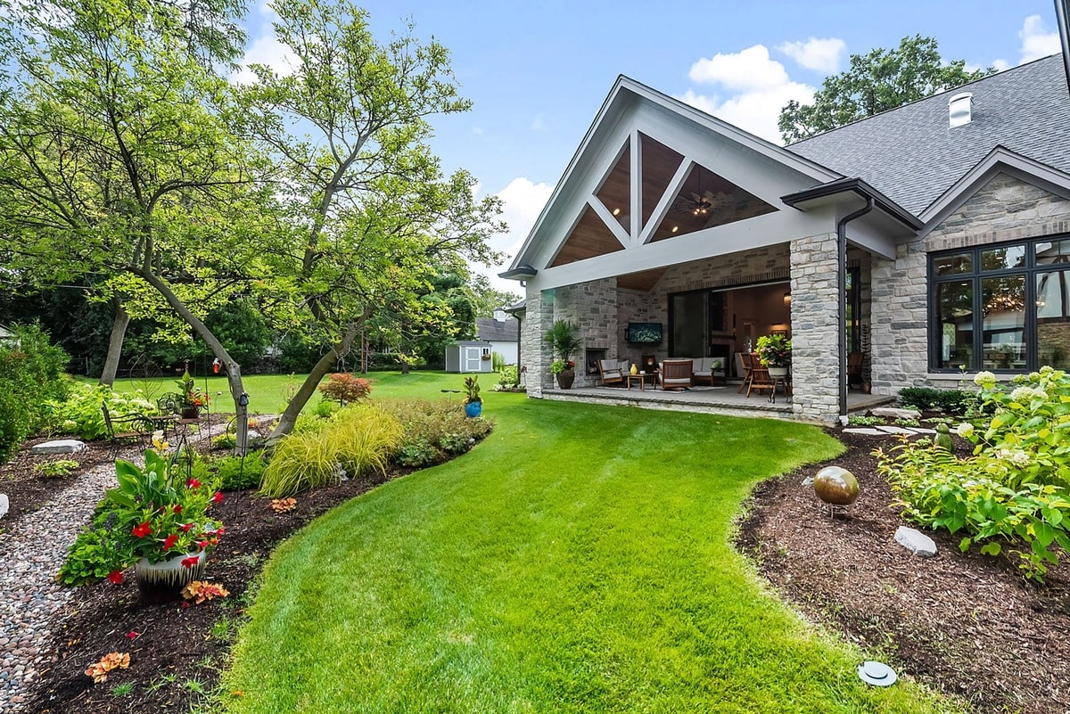 This inviting side view showcases the home's seamless transition between indoor and outdoor living. 