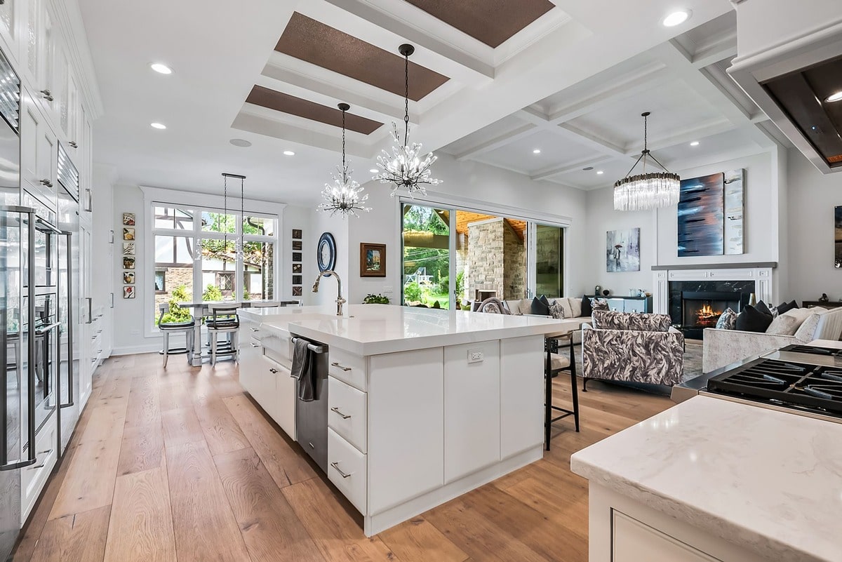 This expansive kitchen, captured from a wide-angle perspective, exudes an air of sophisticated elegance.