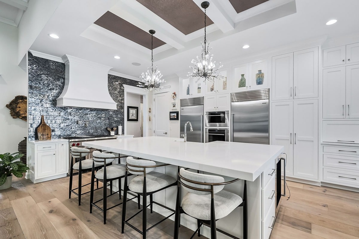 This expansive kitchen, captured from a wide-angle perspective, exudes an air of sophisticated elegance.