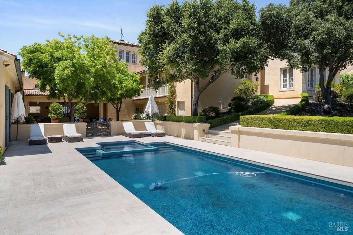 Rectangular swimming pool in the backyard