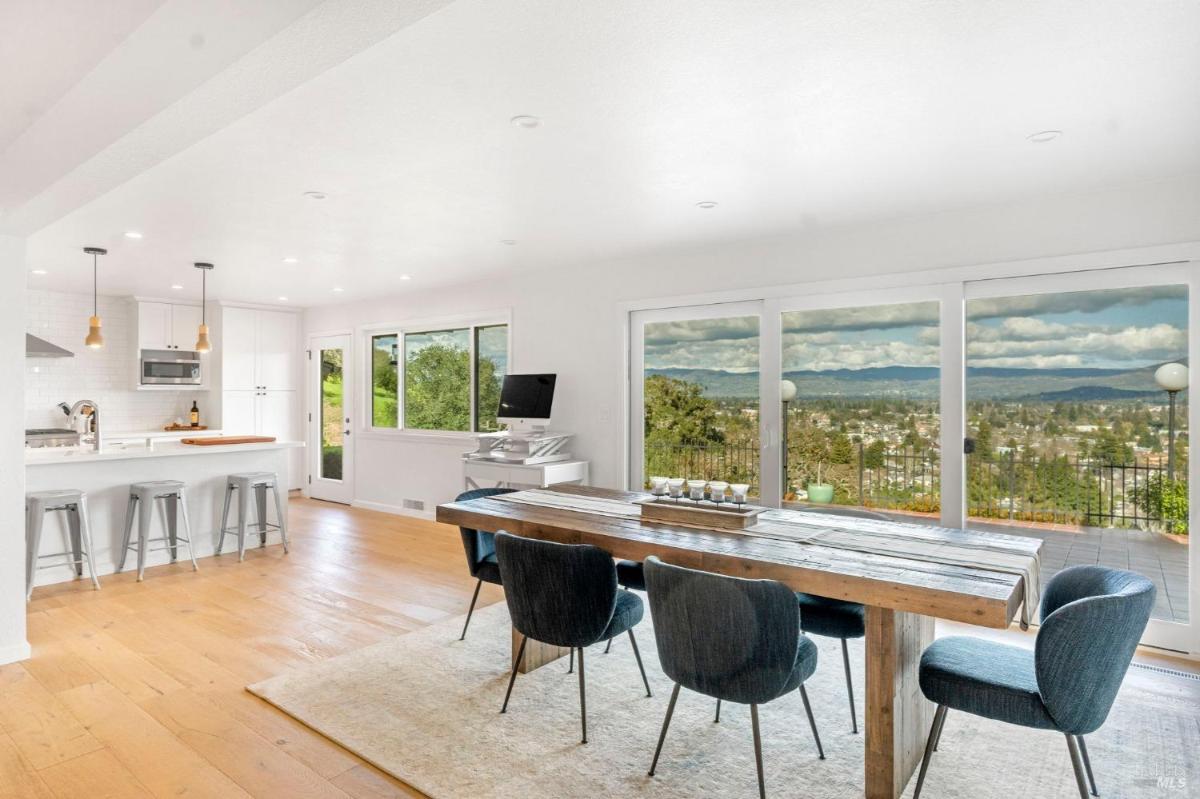 Open-concept dining area with a view of the outdoors.