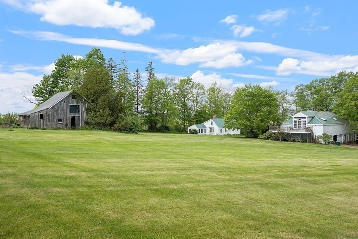 Expansive property with a rustic barn and guest house.