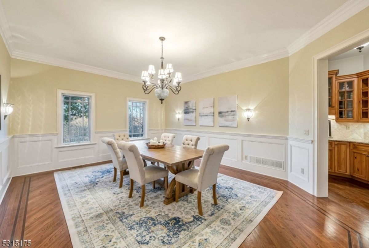 Spacious dining area features soft lighting, natural views, and refined detailing.