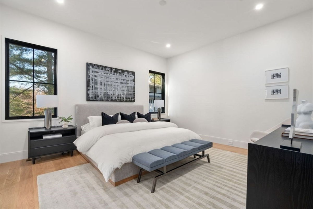 Master bedroom exudes comfort with soft tones and ample natural light.