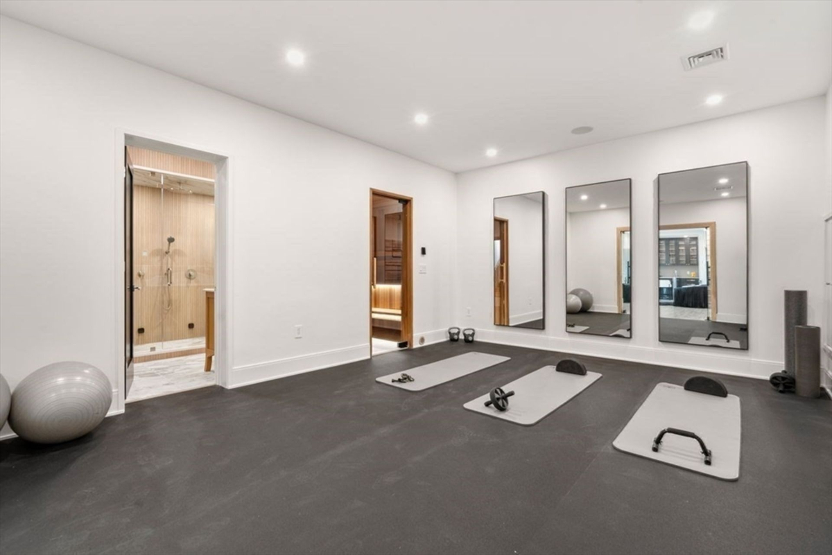 Private gym with a rubberized floor